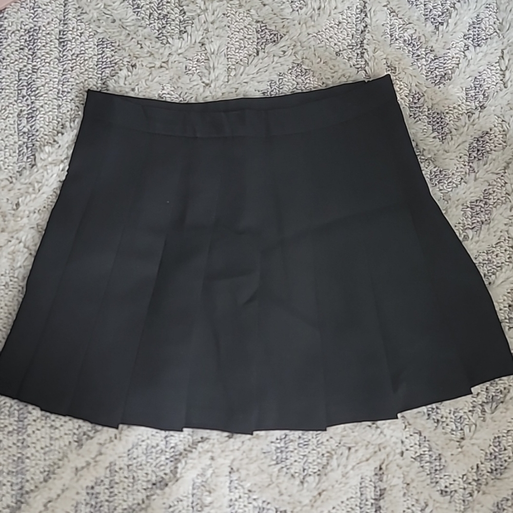 black pleated skirt